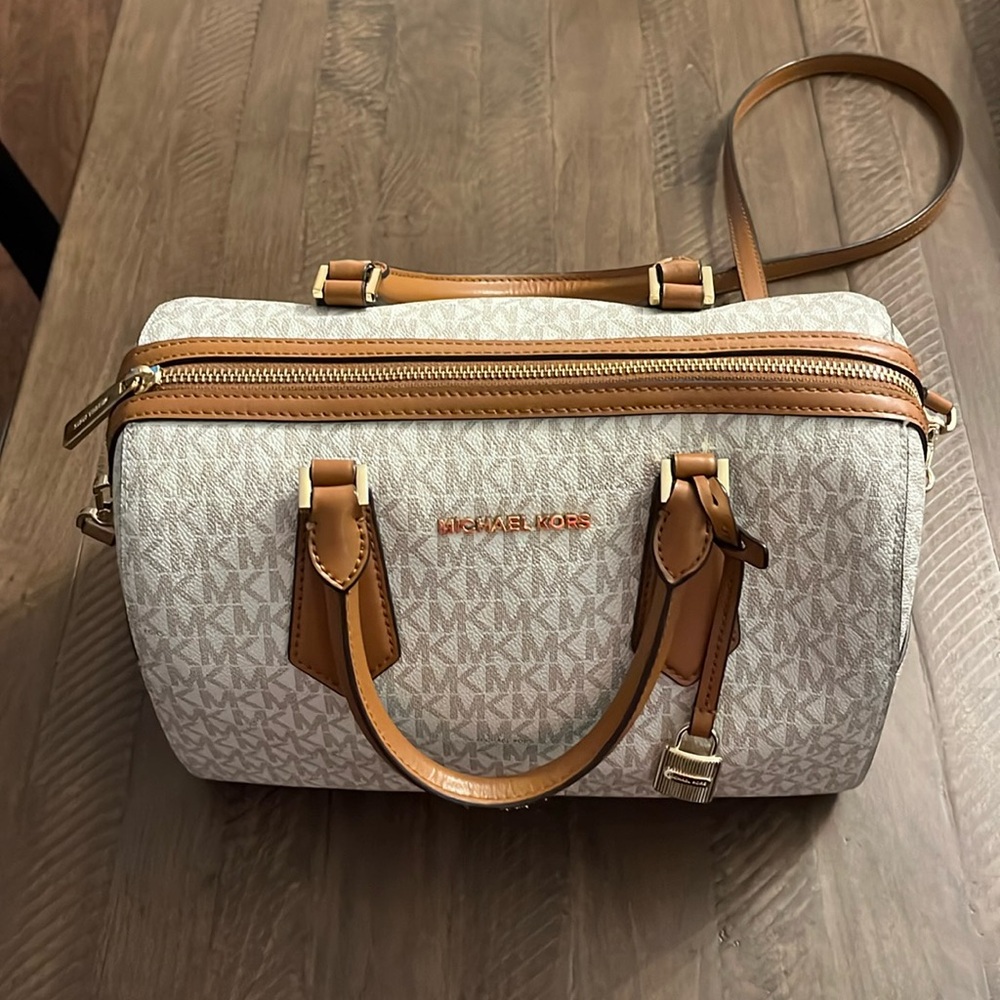 Large Michael Kors handbag with detachable strap.